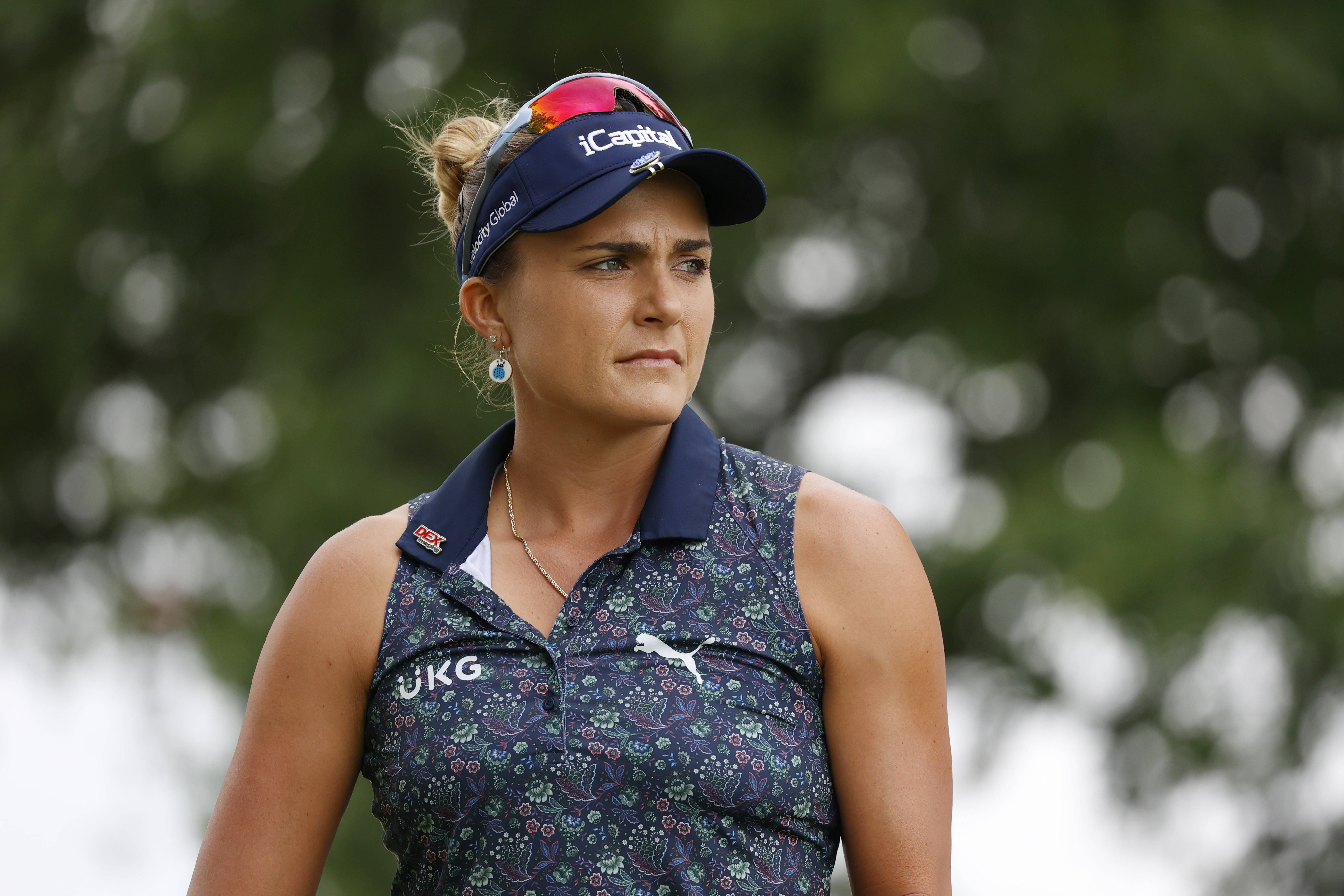 Lexi Thompson plays her tee shot on the 8th hole during the first round of the Kroger Queen City Championship at the Kenwood Country Club in Cincinnati, Ohio. 